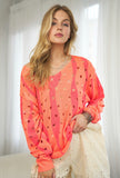 Taye Distressed Neon Orange Sweater